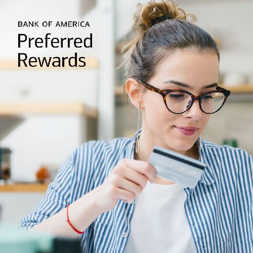 Woman holding a credit card