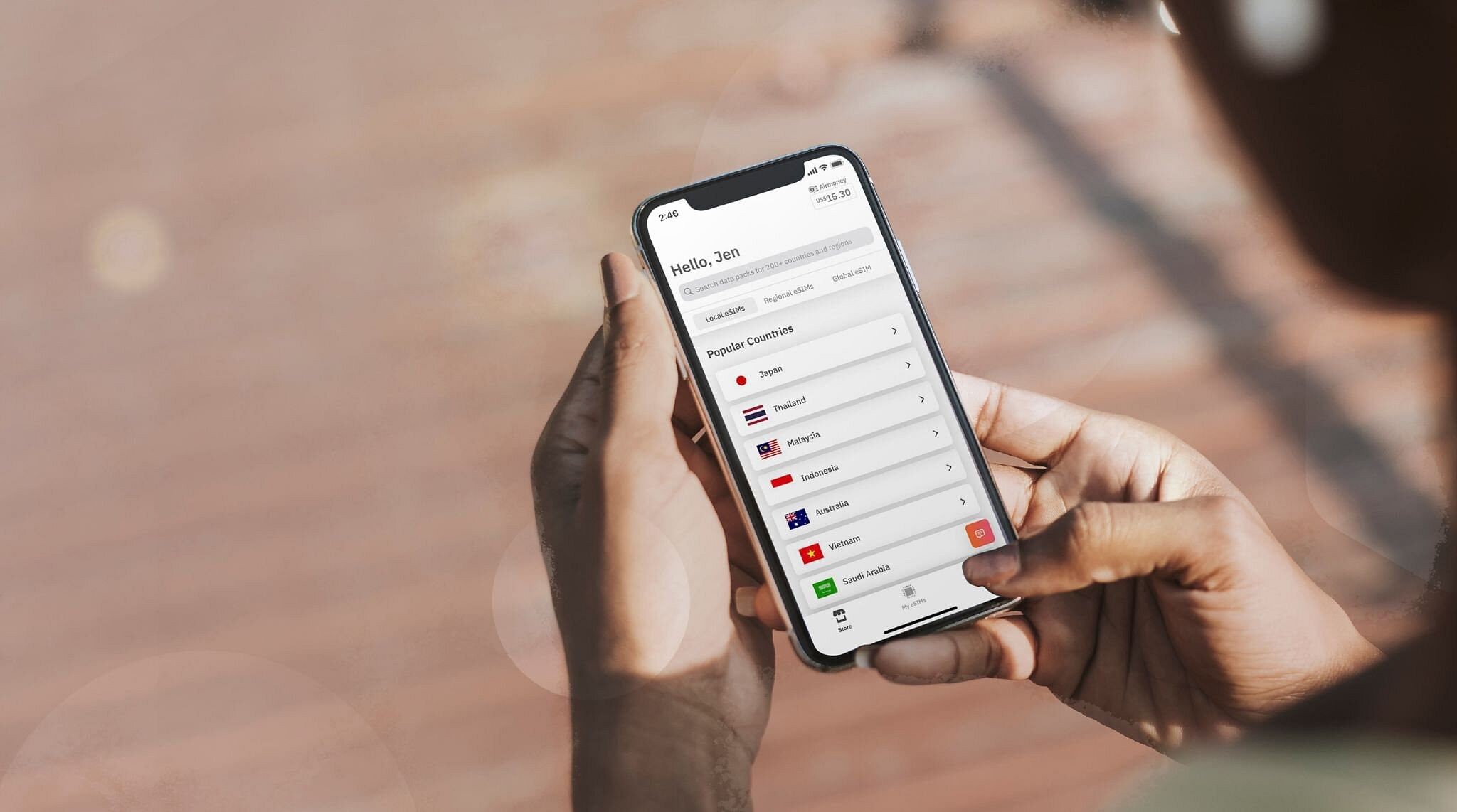 Woman choosing an eSIM from airalo app