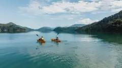 Kayakers enjoying the scenic beauty of New Zealand