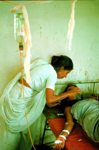 Woman being treated for cholera in poor-resourced Indian hospital