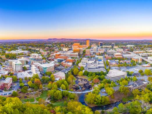 Downtown Greenville Skyline Reflecting the Blue Ridge Mountains, illustrating Greenville's natural and urban harmony