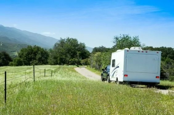 Travel trailer on a country road, demonstrating the potential for rocking due to uneven terrain