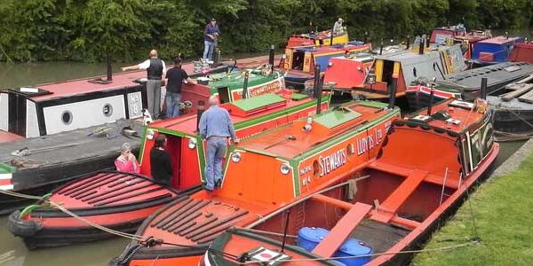 Traversing the waterways: Narrowboat approaching a lock gate