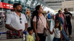 Passengers boarding a flight after a ceasefire, showcasing the resumption of air travel