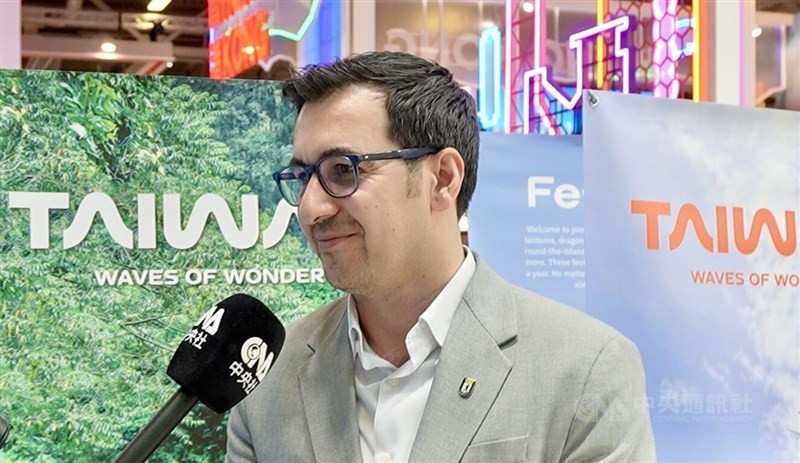 German politician Jian Omar speaks to CNA at ITB Berlin, emphasizing Taiwan's progressive openness.