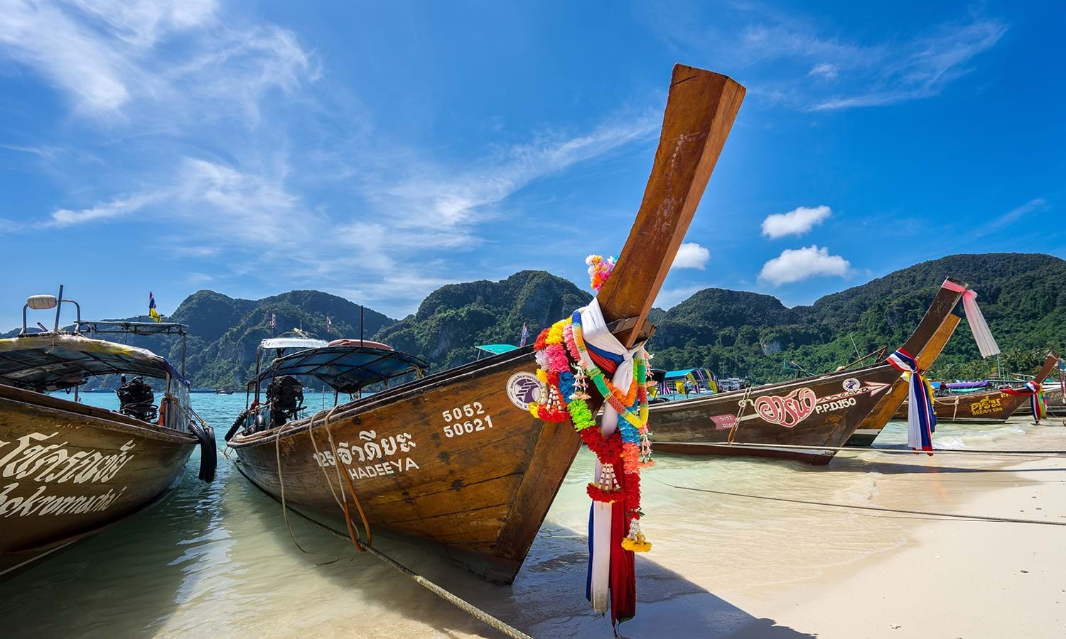Longtail boat sailing in Thailand sea