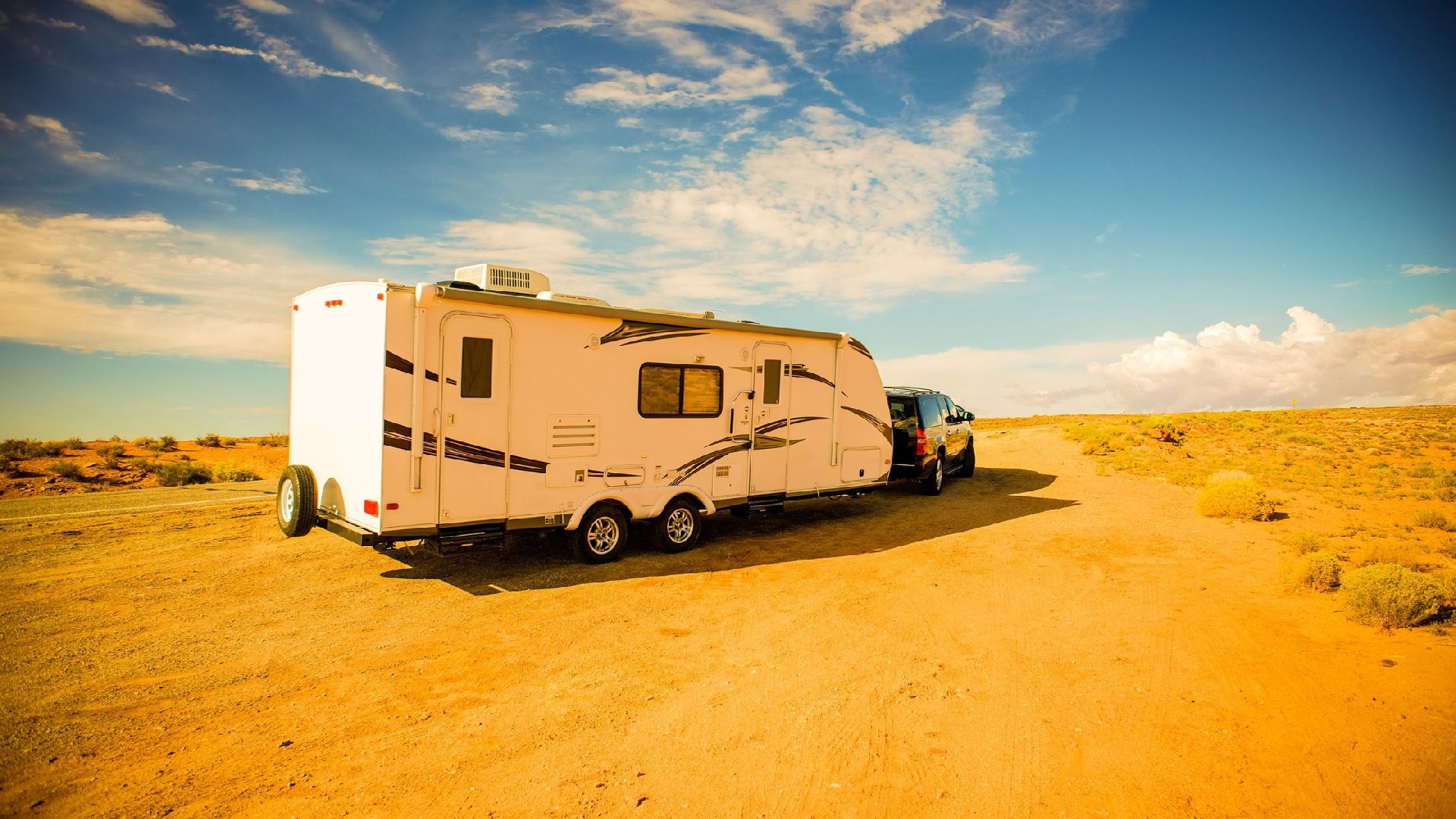 Travel trailer parked at a campsite