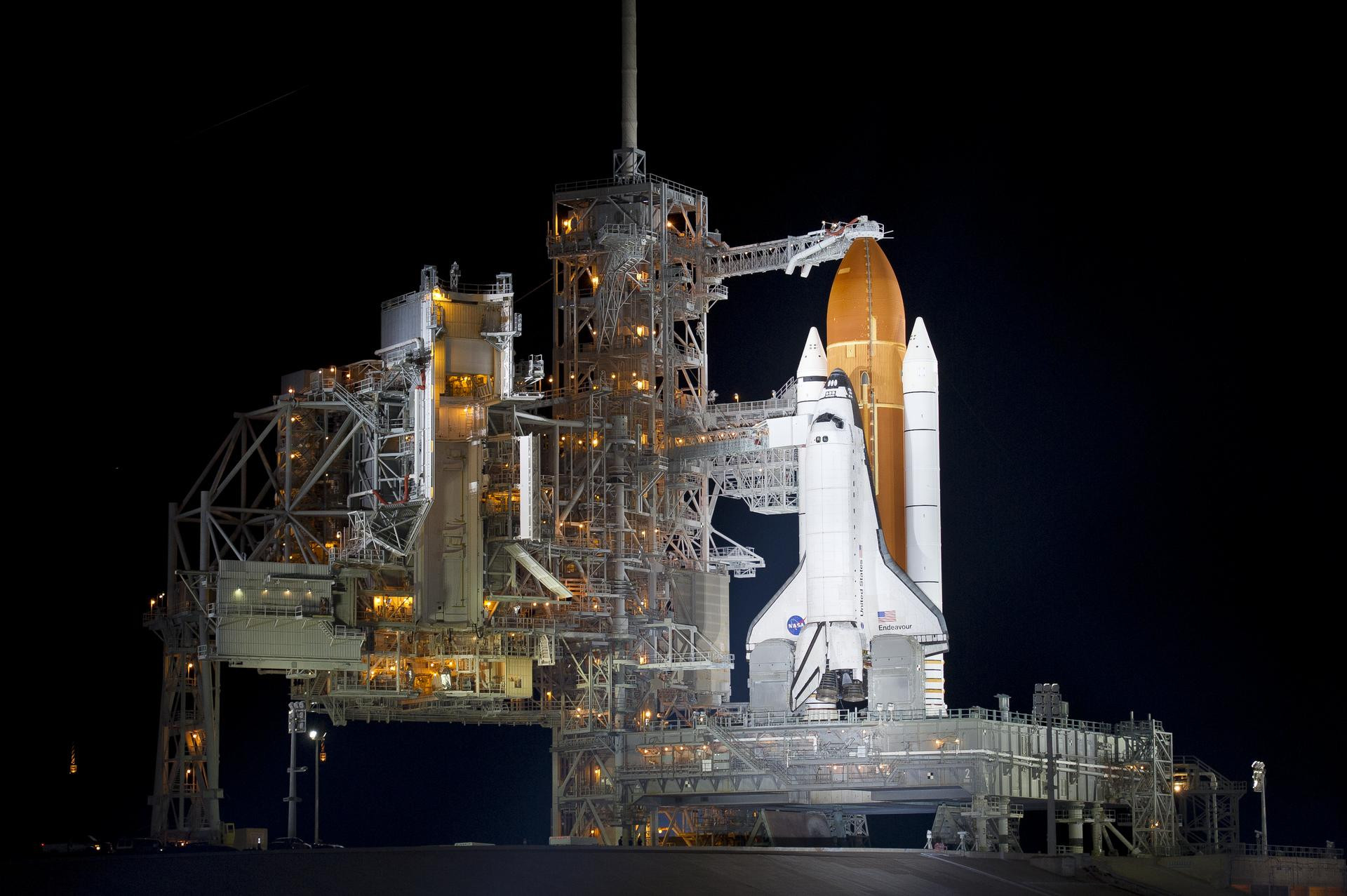 The space shuttle Endeavour is seen on launch pad 39a after the rollback of the Rotating Service Structure (RSS), Thursday, April 28, 2011, at Kennedy Space Center in Cape Canaveral, Fla.