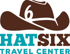 Dog park at Hat Six Travel Plaza for pet-friendly travel stop with shaded areas and waste disposal stations