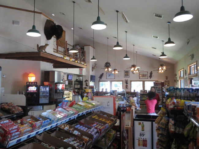 Outpost Travel Center-employee talking to customer.jpg