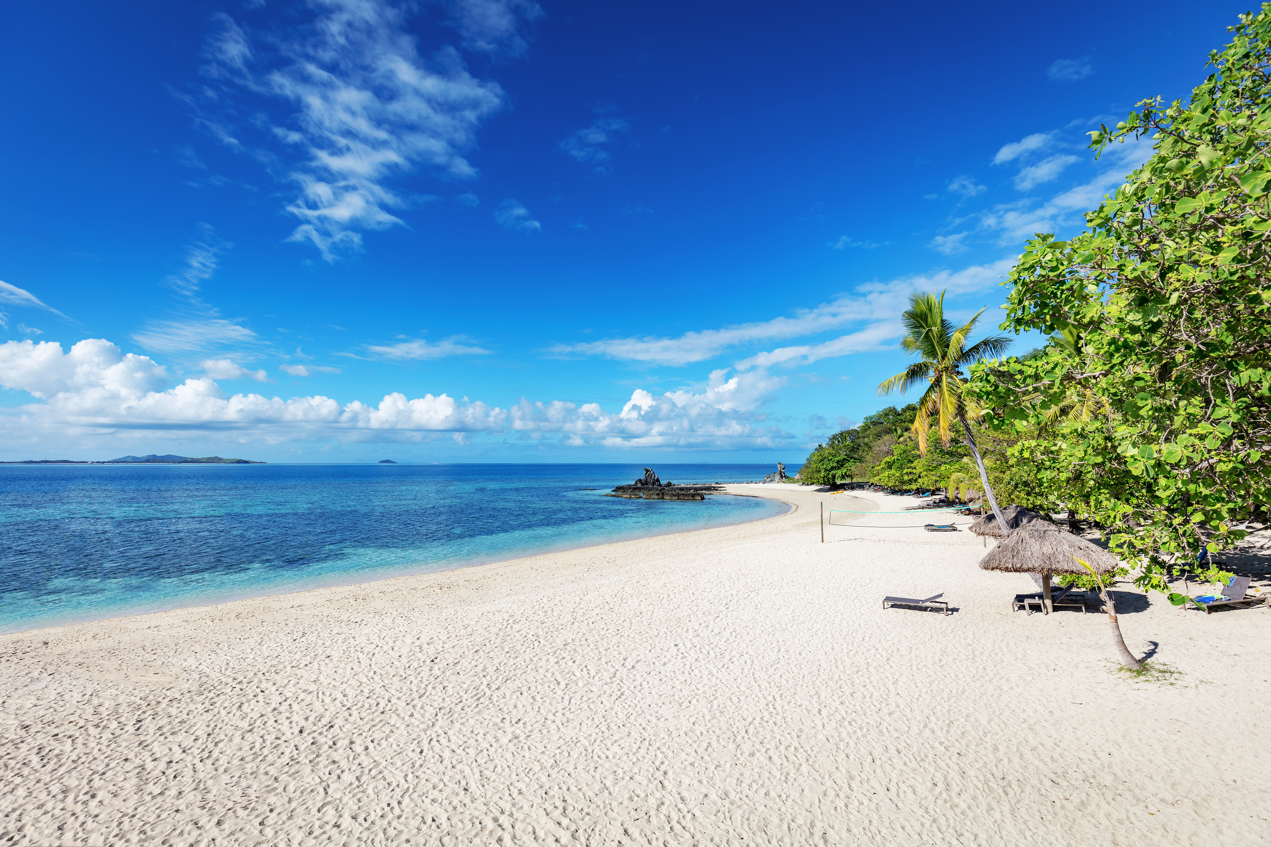 Castaway Island, Fiji, featuring lush vegetation and clear turquoise waters