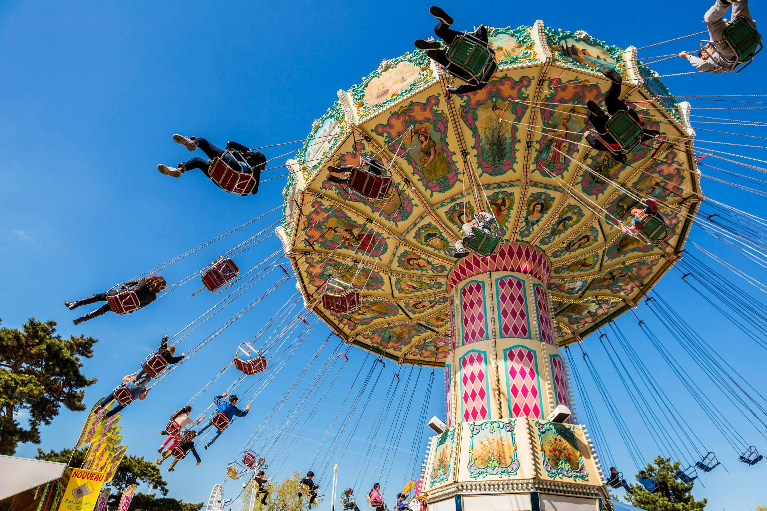 The vibrant Foire du Trône funfair in Paris, capturing the city's springtime energy
