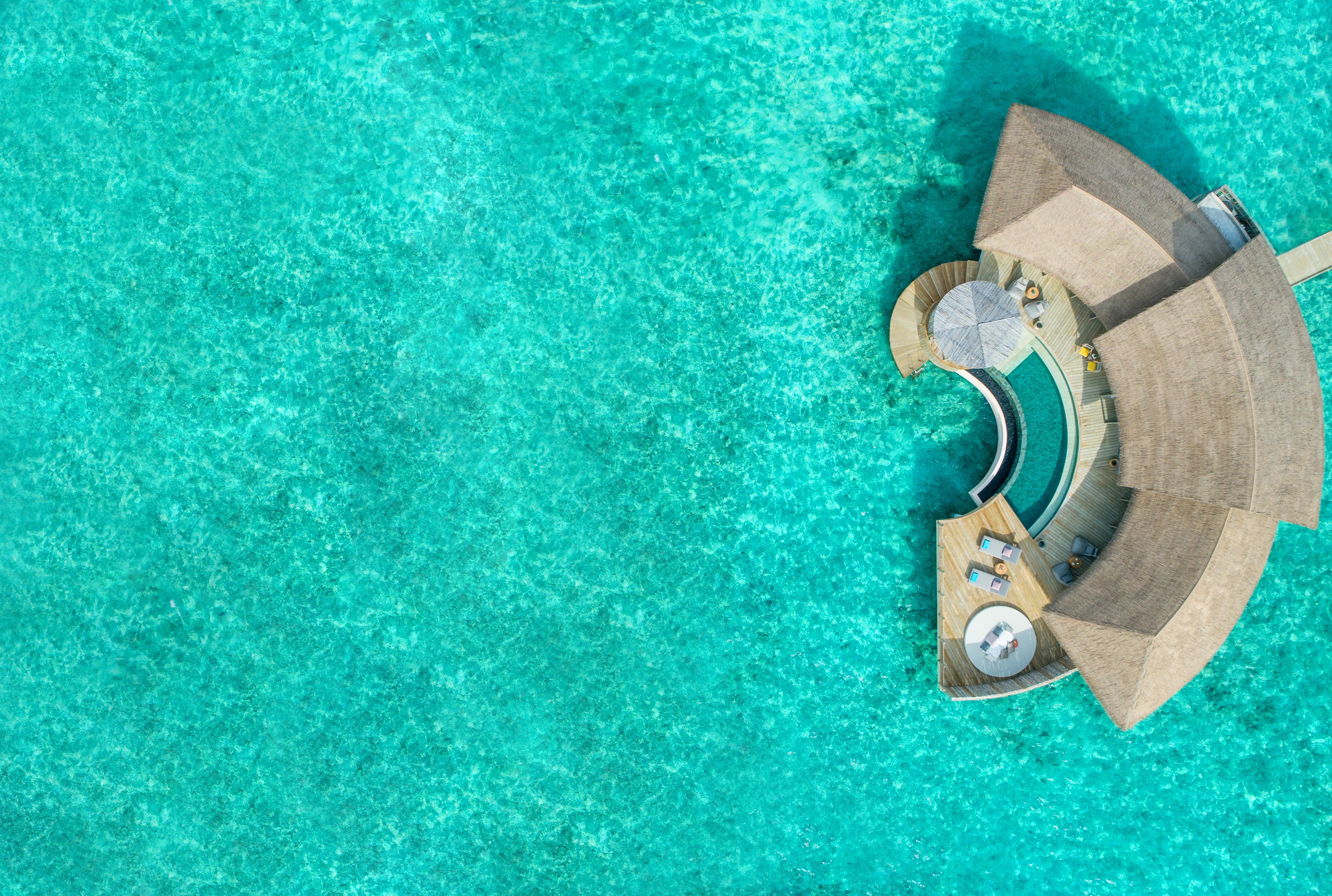 Enjoy Christmas morning snorkeling on the house reef at The InterContinental Maldives Maamunagau.