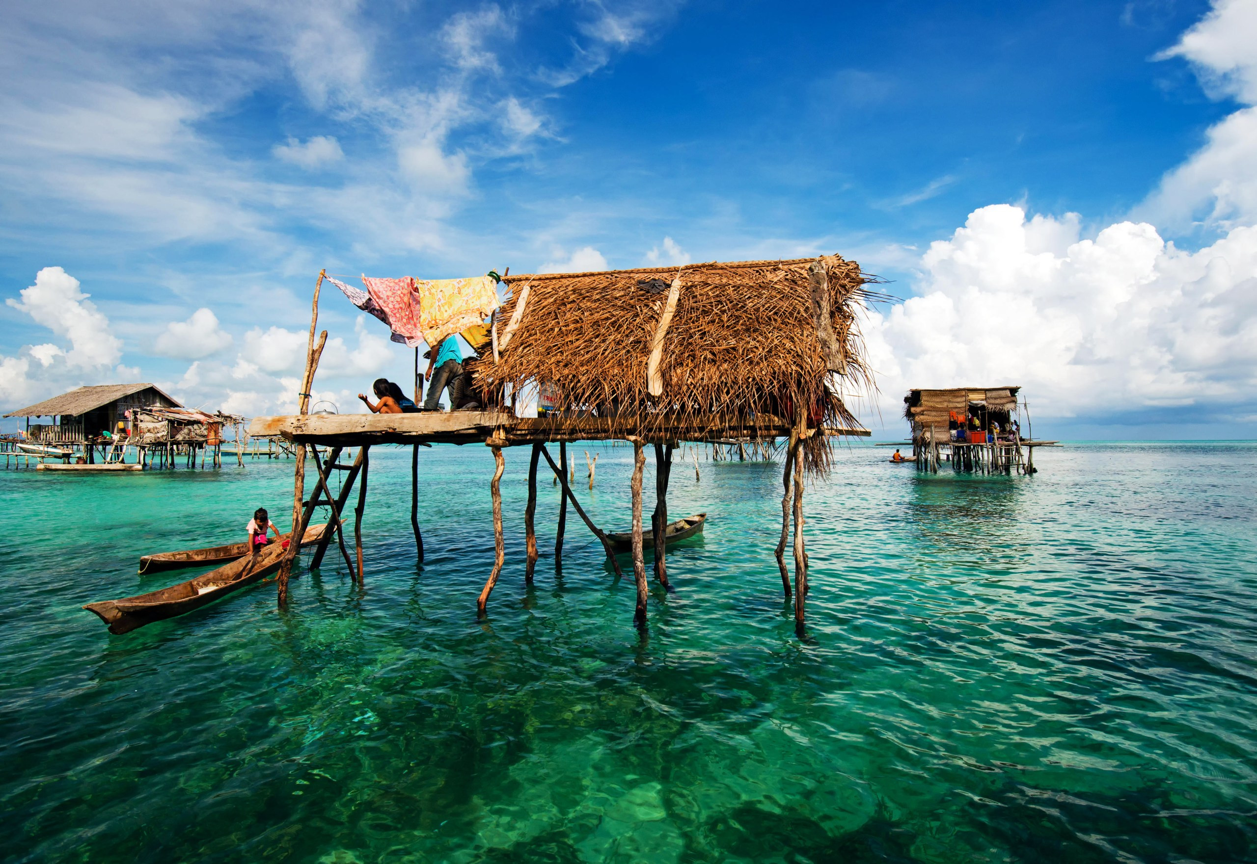 A village of stilted houses off the coast of Borneo, highlighting the island's unique culture