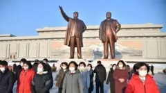 Kim Il Sung Square in Pyongyang, North Korea, bustling with people