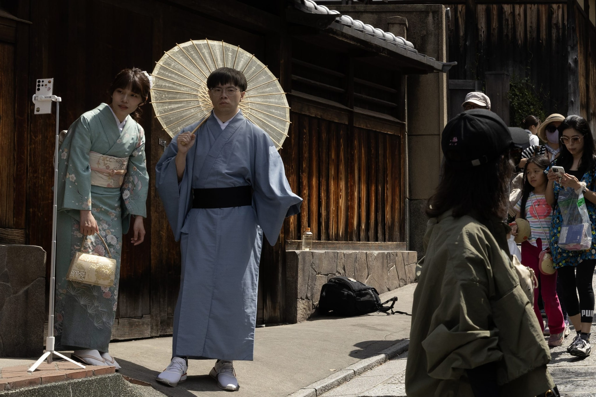 Tourists visiting Senso-ji Temple in Tokyo, Japan, highlighting the blend of tradition and modernity