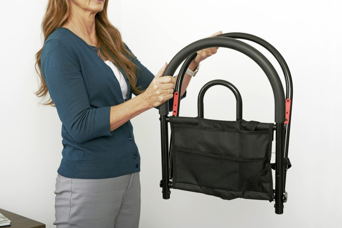 Travel bed rail folded, ready for suitcase storage