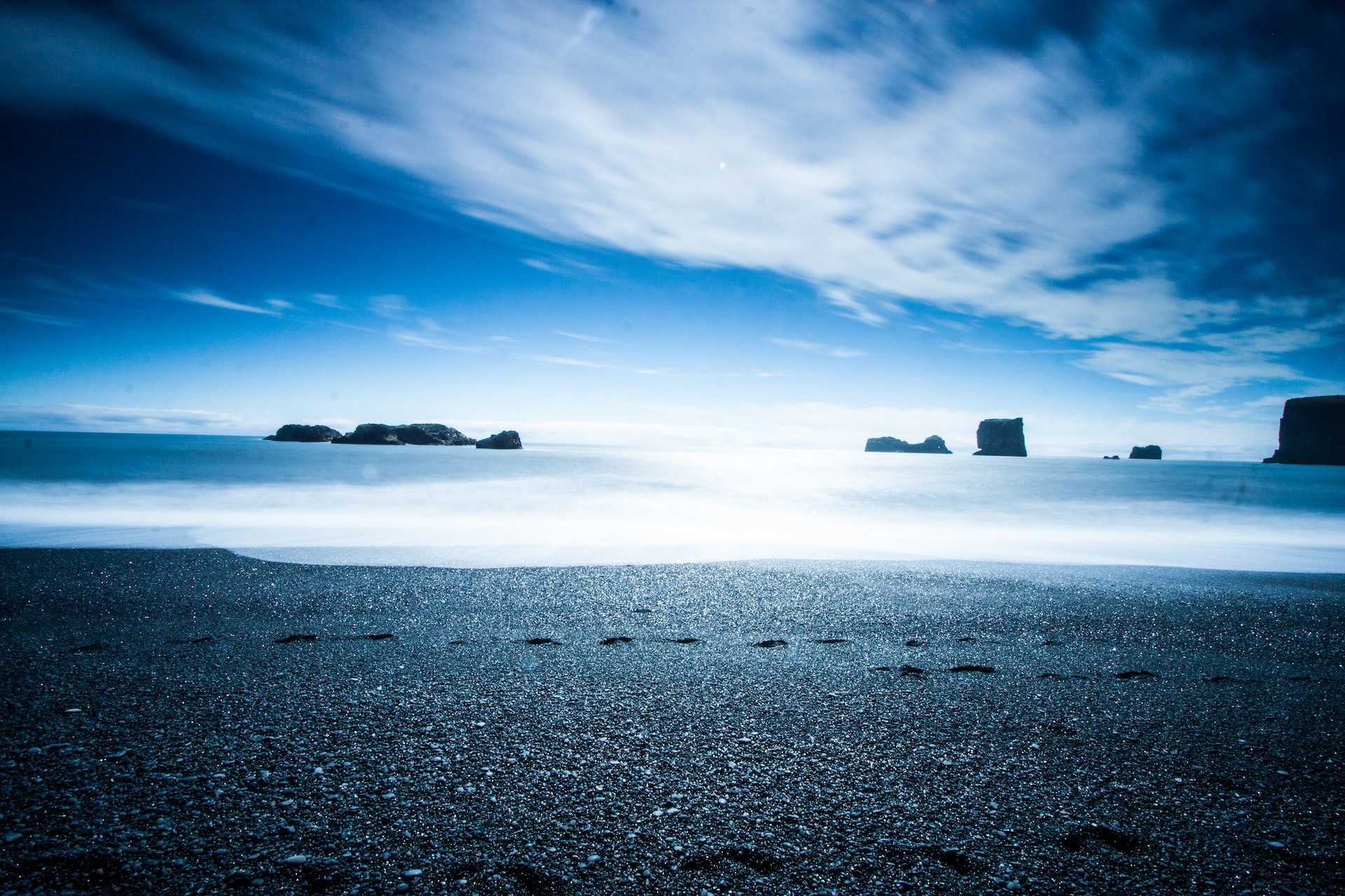 A solo traveler embarking on a quest for self-discovery in a serene mountain landscape.