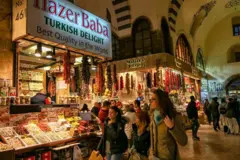 Tourists exploring the Egyptian Spice Bazaar in Istanbul, Turkey