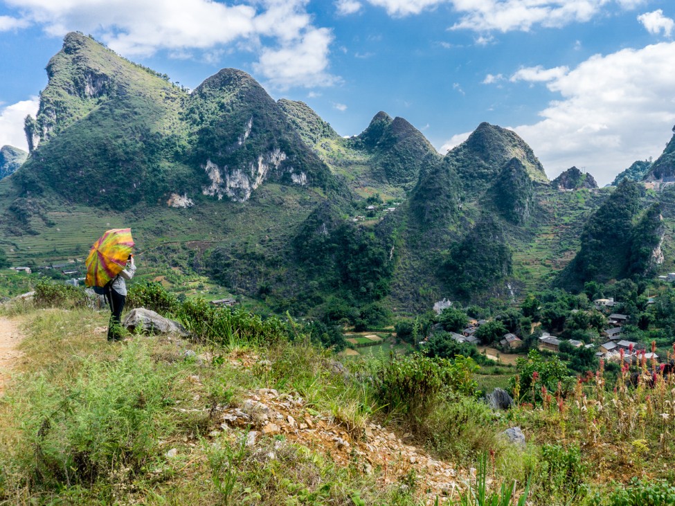 A group of trekkers exploring a Tuyen Quang local ethnic village.