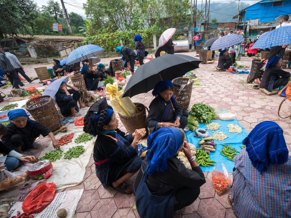 Locals in traditional costumes celebrating a festival in Tuyen Quang.