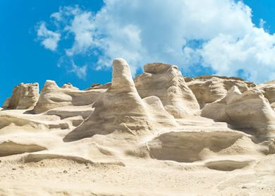 Sarakiniko Beach in Milos, showcasing the island's unique lunar-like beaches and volcanic rock formations.