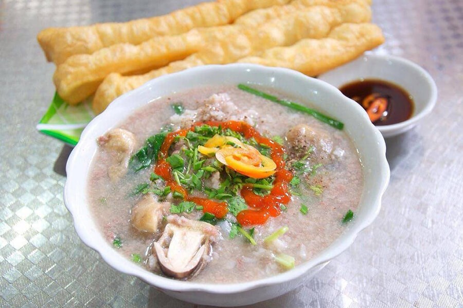 Acorn Barnacle Porridge (Chao Ha), a comforting congee made with acorn worms, marinated with pepper and fish sauce