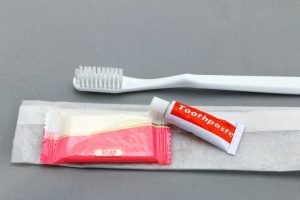 Travel essentials including a small tube of toothpaste