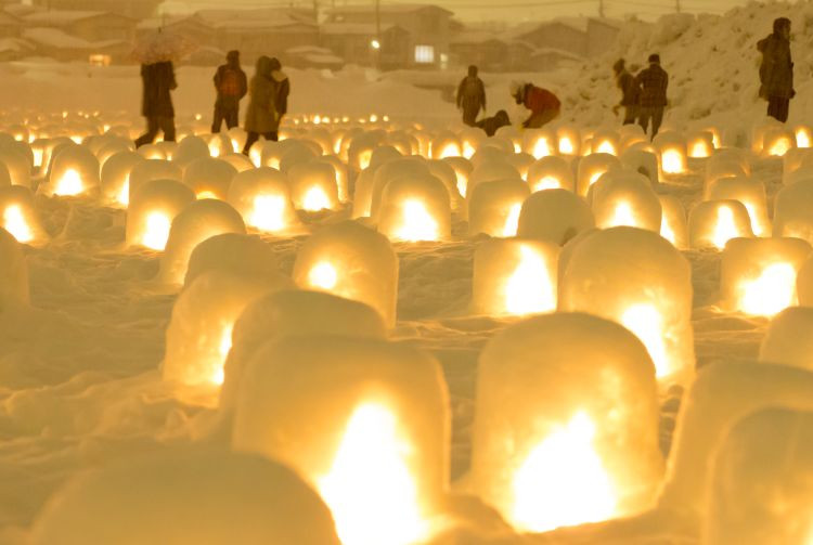 Snow candles illuminating the Yokote Kamakura Festival