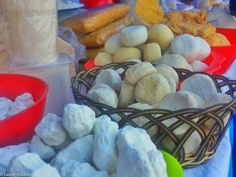 A bustling market scene in Almaty, Kazakhstan, showcasing local vendors and fresh produce
