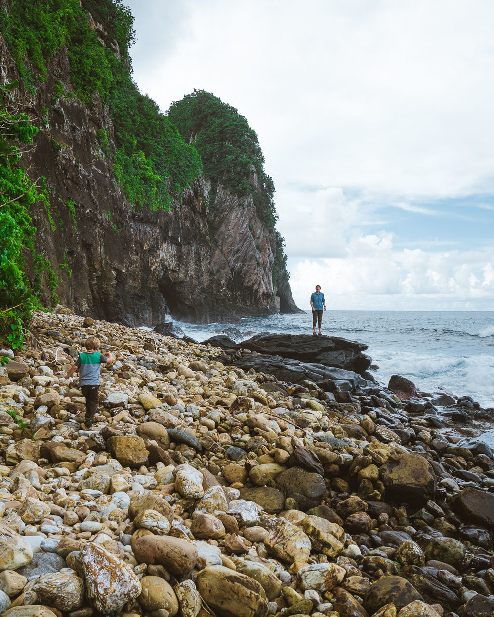 Picturesque Vatia Village nestled against the backdrop of American Samoa’s stunning coastline.