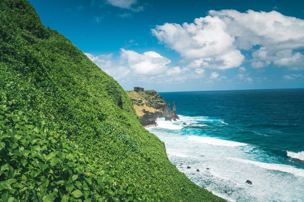 Scenic Oge Beach Trail in American Samoa, overlooking crystal waters and coastlines.