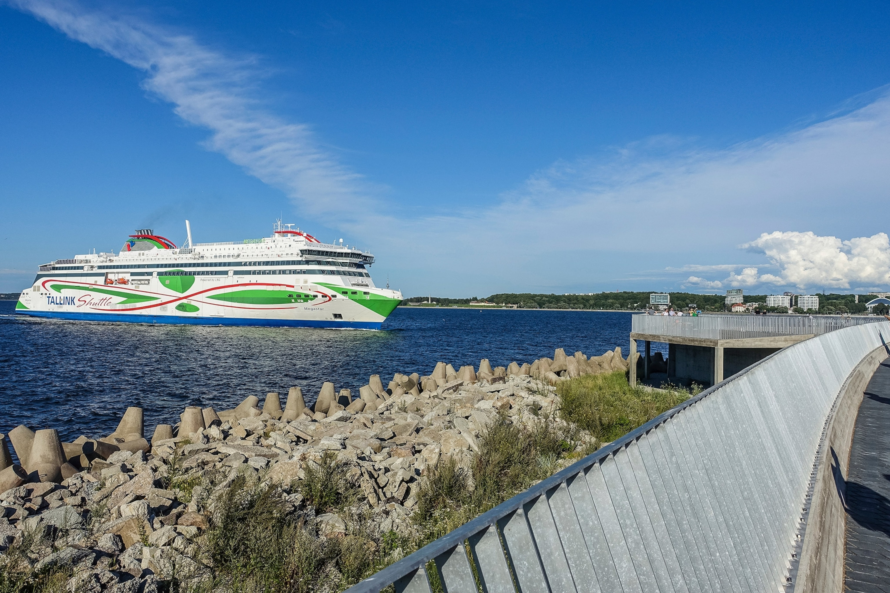 Ship on water under blue skies, travelling from Tallinn to Helsinki.