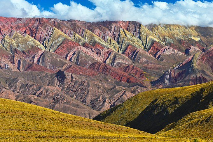 The Quebrada de Humahuaca's striking colors and ancient landscapes create a visual masterpiece, drawing travelers into Argentina's rich cultural tapestry and geological wonders.