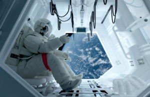astronaut wearing spacesuit near shuttle window