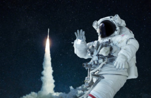 astronaut waving at earth from space