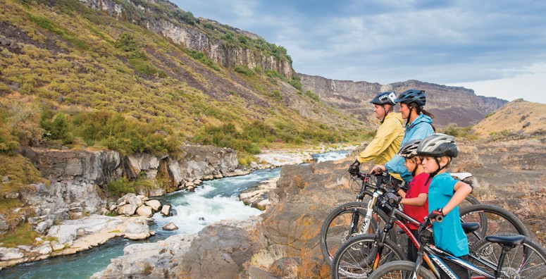 Mountain bikers exploring the trails at Auger Falls near Twin Falls
