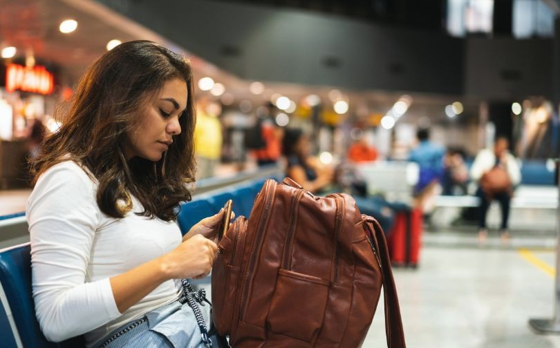 Traveler preparing for flight at the airport