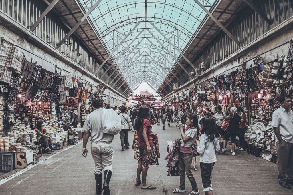Bustling scene at Baguio Public Market, featuring a variety of local goods and souvenirs for shoppers to explore
