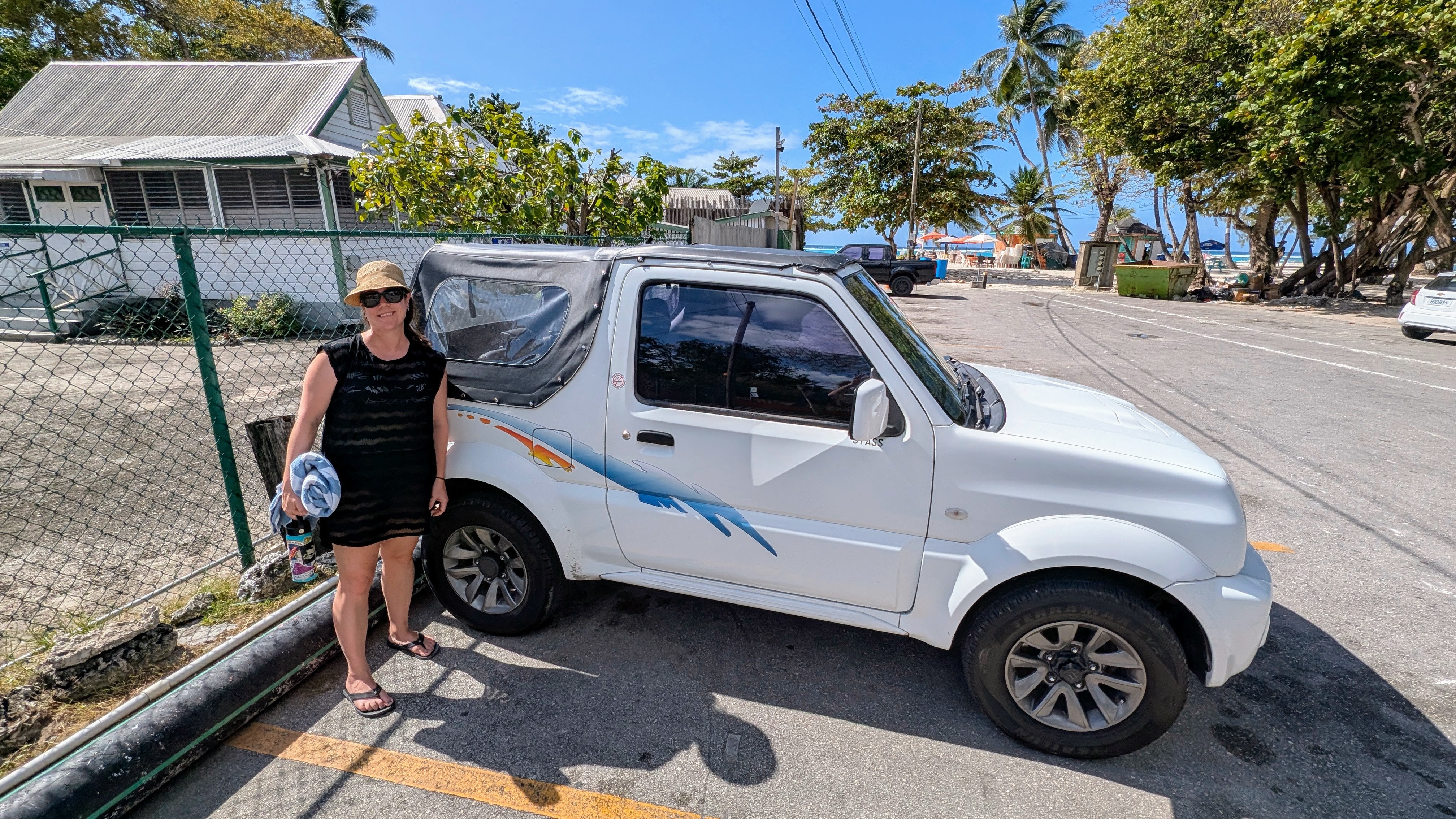 Rental car, a Jimny, driving in Barbados, showcasing the ease of exploring the island
