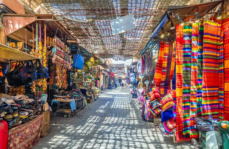 Souvenirs at the Jamaa el Fna market in old Medina, Marrakesh, featuring colorful displays and cultural items