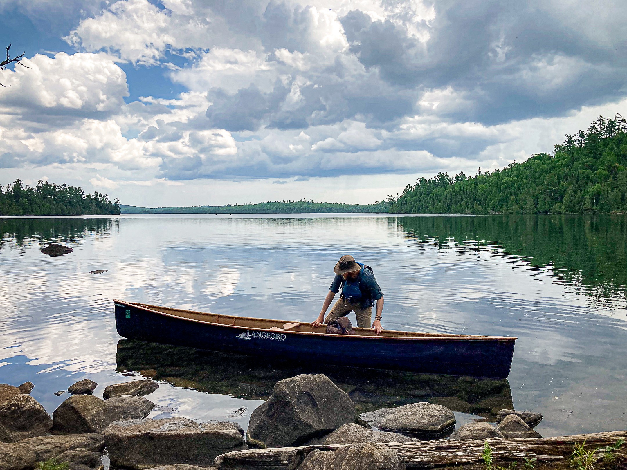 Canoeing in the Boundary Waters Canoe Area Wilderness, highlighting water activities in northern Minnesota