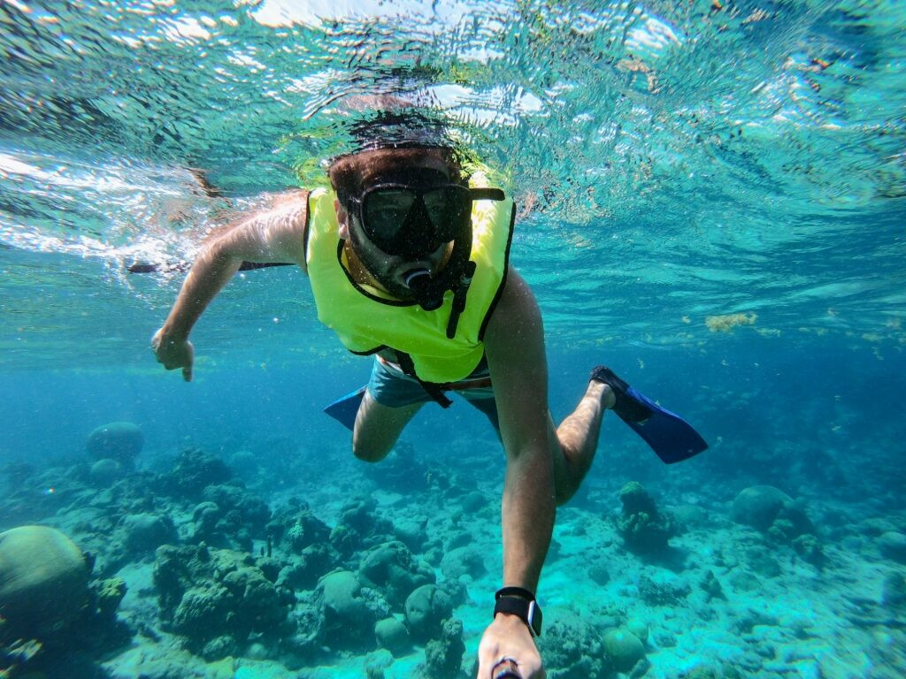 Man snorkeling in Buck Island, ideal for winter excursions