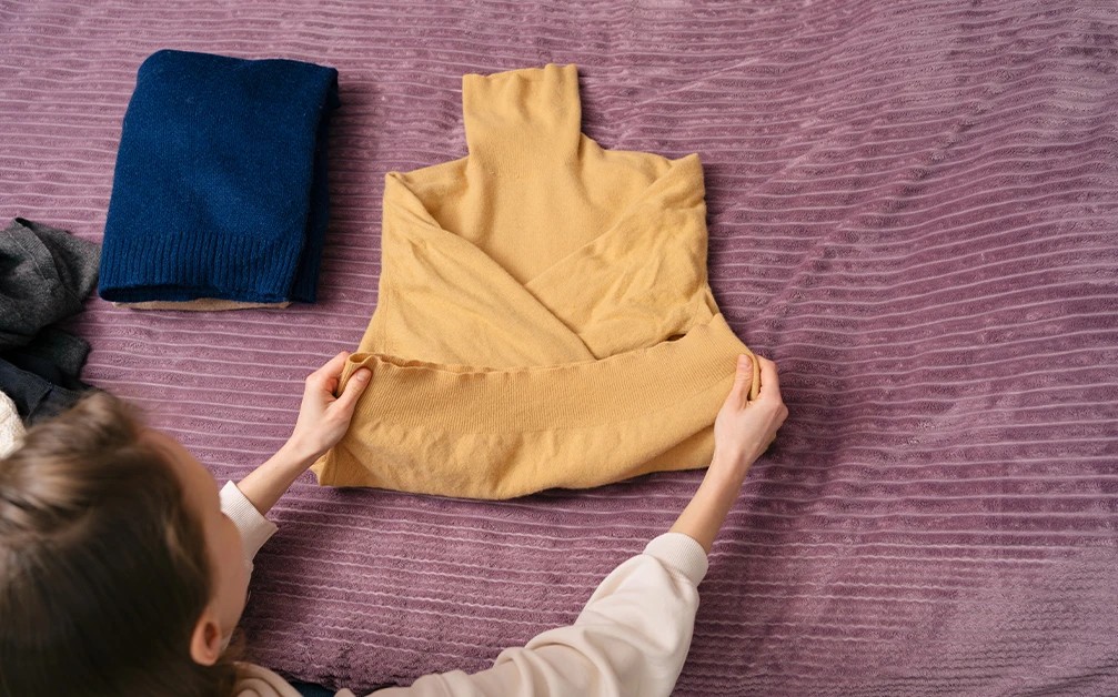 Sweatshirt folded neatly for travel