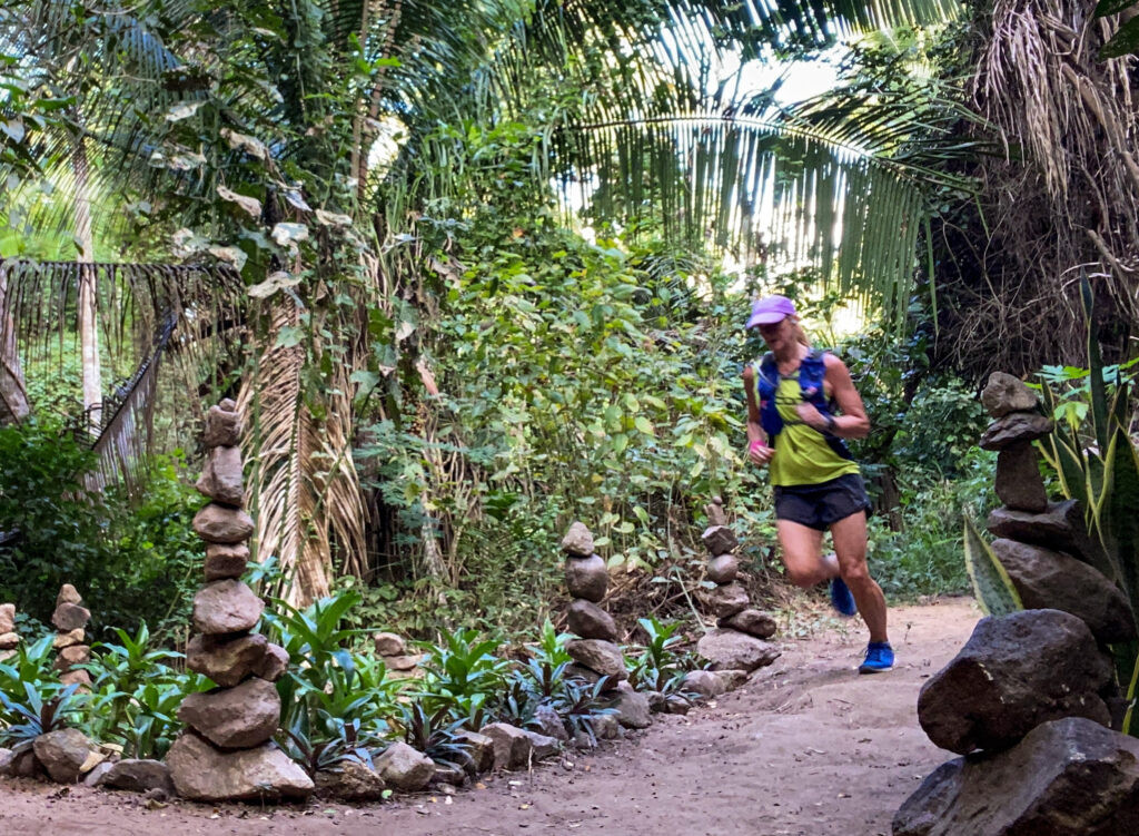 Beth Whitman running in Sayulita, showcasing her adventurous spirit and love for travel