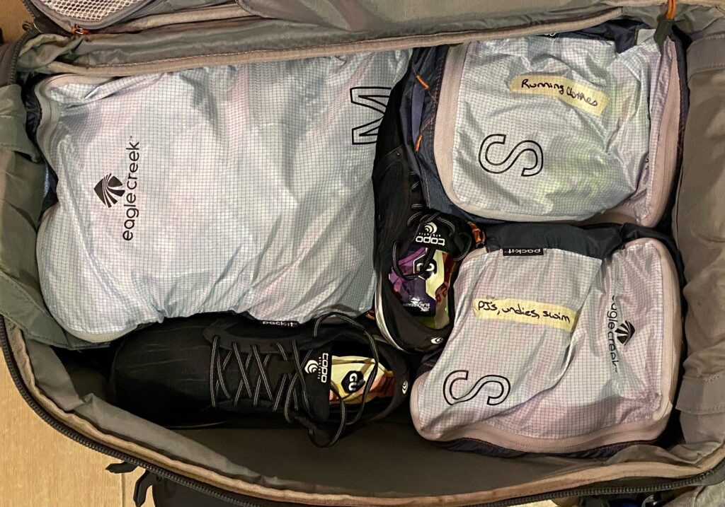 An example of Beth Whitman packing her ST-3s shoes, highlighting the concept of packing light and efficiently for travel