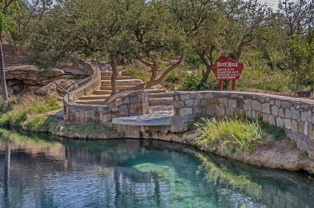 Blue Hole of Santa Rosa - People swimming at blue water hole