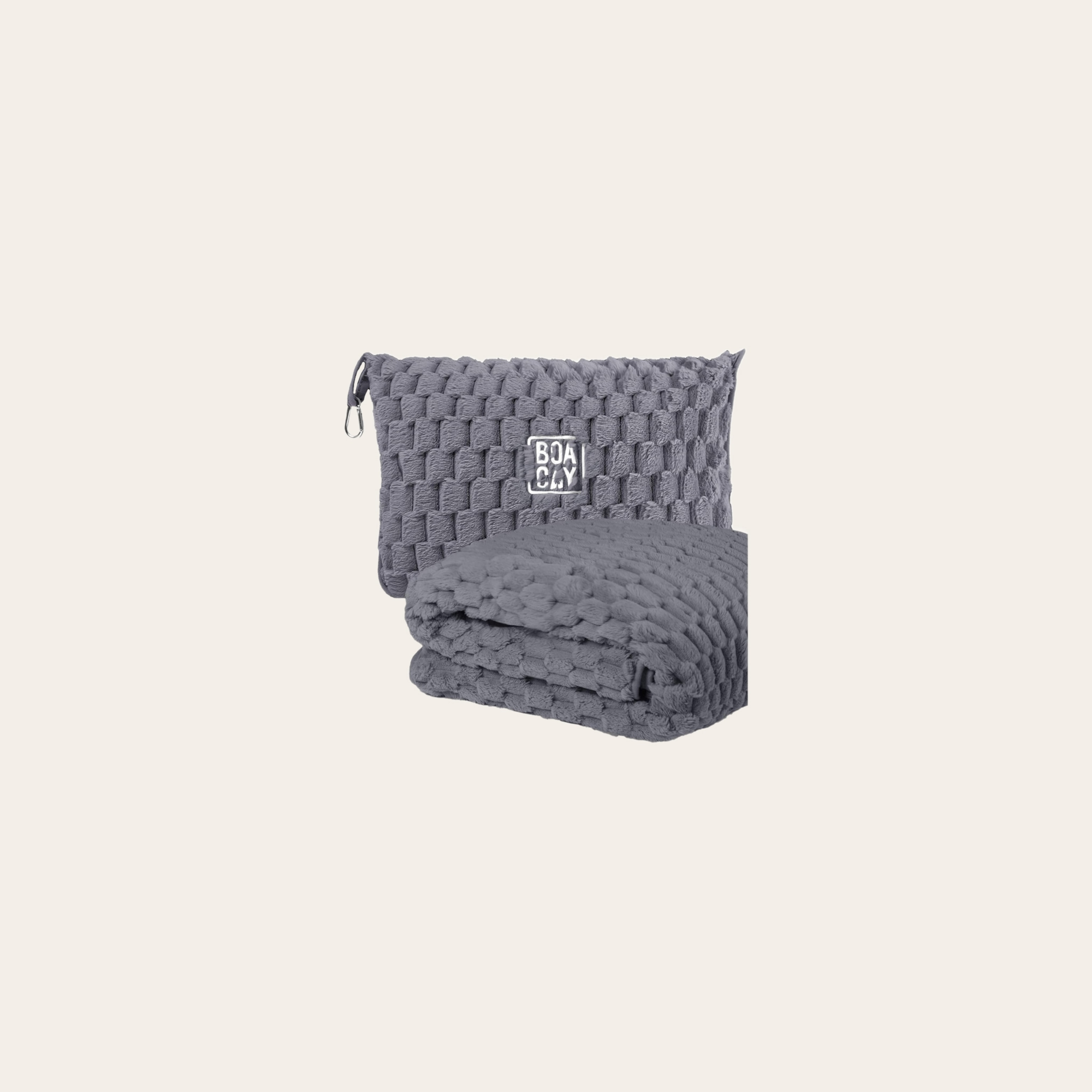 Boacay Packable Travel Blanket features a velvety texture and zips into a pouch that doubles as a pillow.