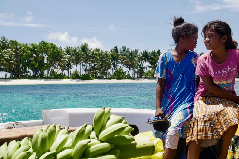 Colorful outrigger canoes on the shore of Majuro Atoll, reflecting the vibrant local culture