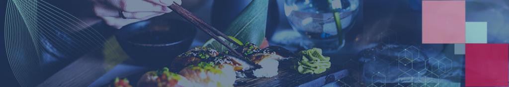 A luxurious dining setting in a high-end restaurant in Vietnam, showcasing beautifully plated dishes.